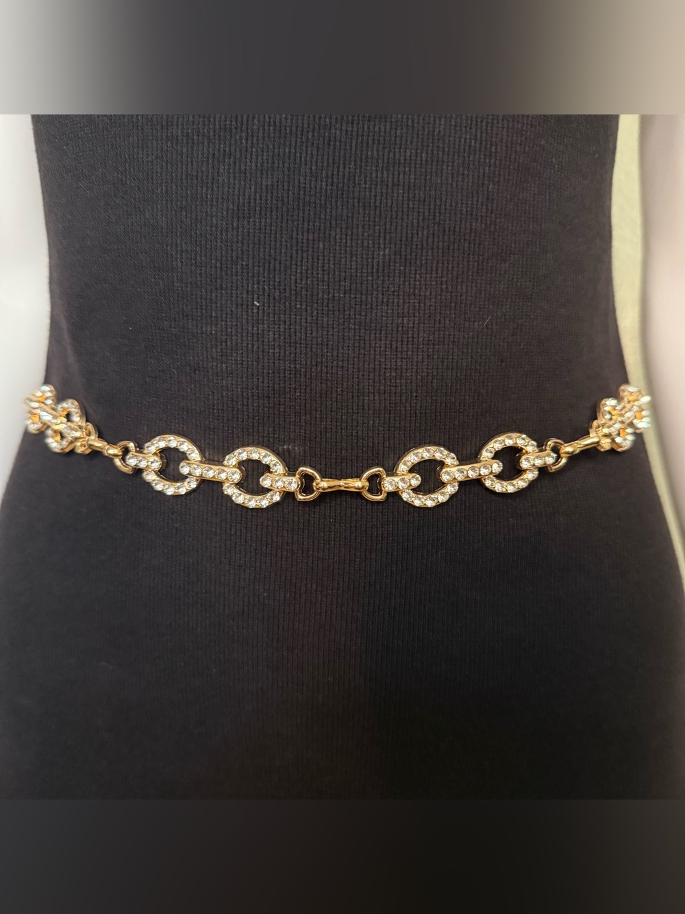 Gold tone oval links metal chain belt with rhinestone details